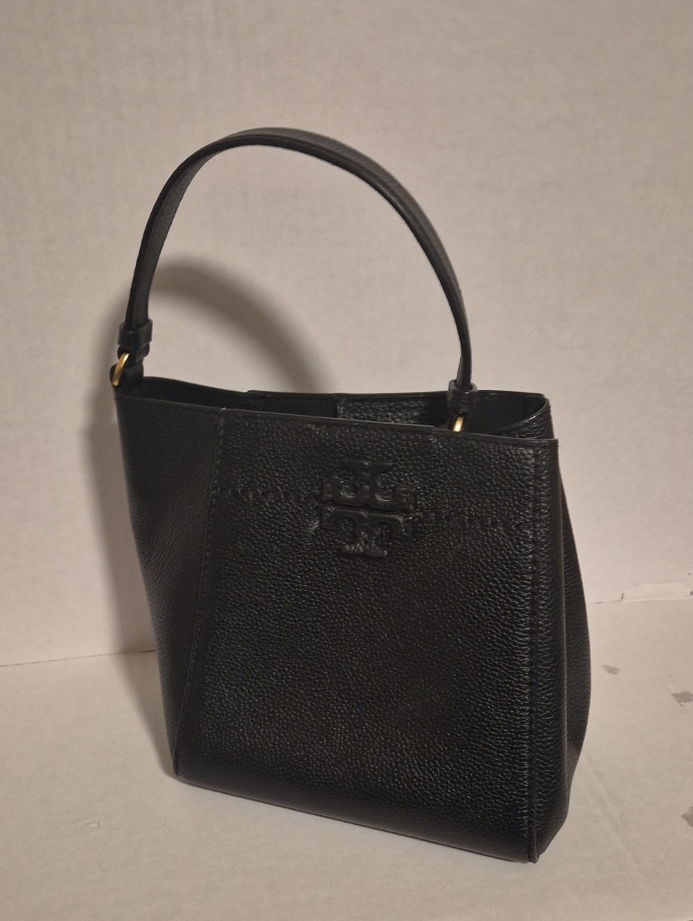 Tory Burch Black Pebbled Leather Top-Handle Bag .